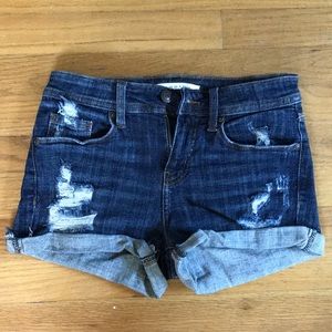 Rolled ripped jean shorts